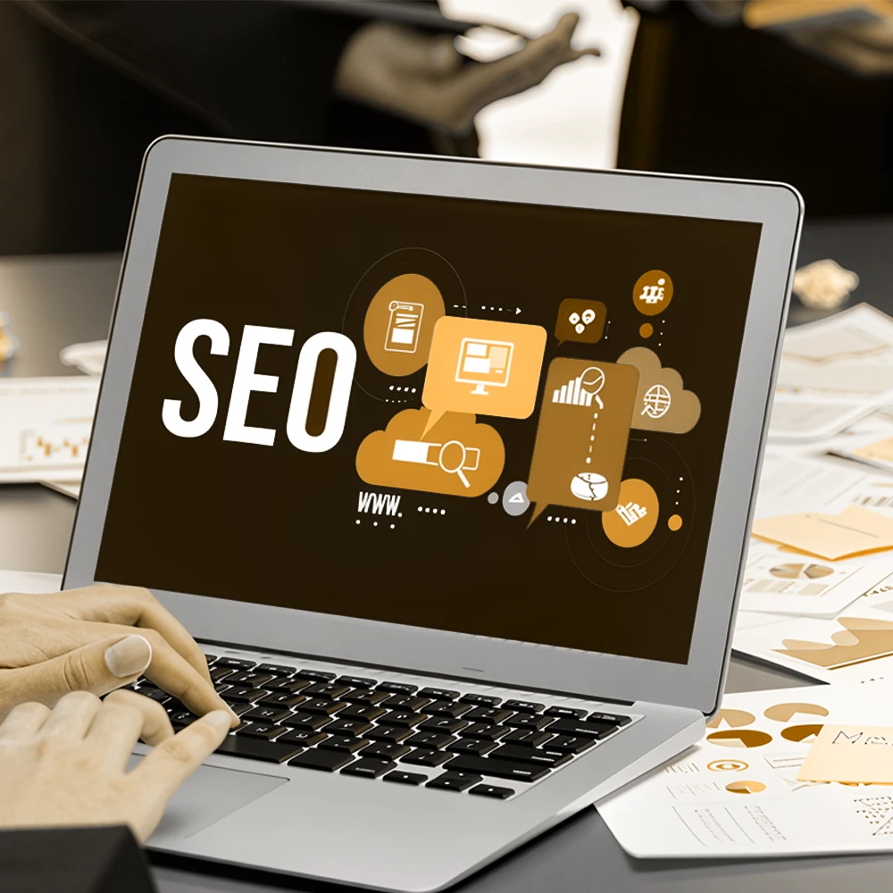 Laptop screen displaying SEO concepts with icons