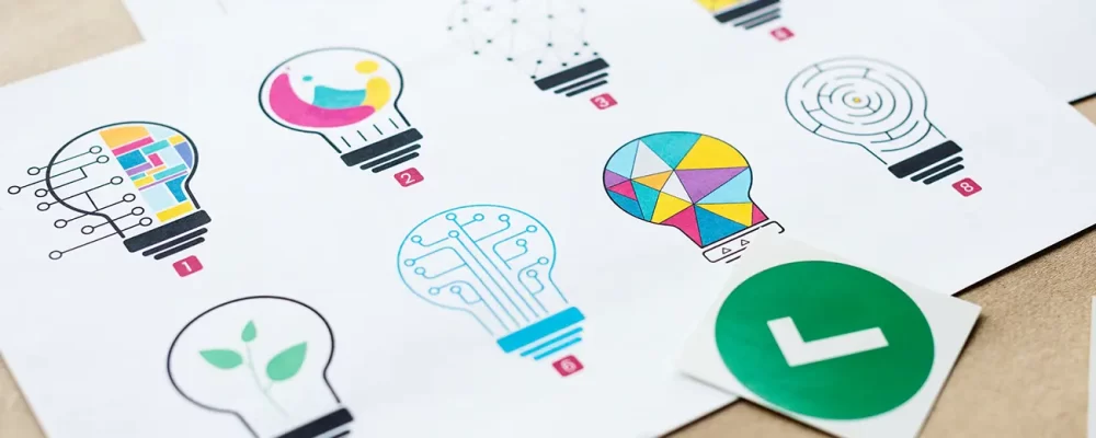 Colorful sketches of light bulbs with various designs